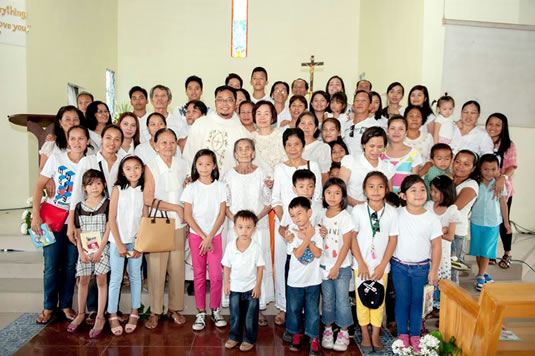 Lola dressed in white at my ordination