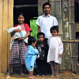 Subanen Crafter Marcelita Balido with her family