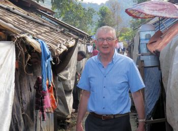 Fr. Neil Magill in an IDP camp